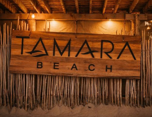 Exterior view of Tamara Beach Club in Cabo overlooking Médano Beach